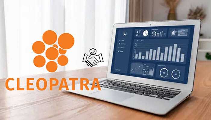Benefits of integrating cleopatra enterprise with sto management software - tycoonstory | tycoonstory media Cleopatra enterprise dashboard on a laptop showing performance analytics and bar charts, representing advanced project management tools.