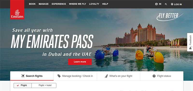 Emirates homepage featuring a promotion for my emirates pass and a scenic beach view in dubai.