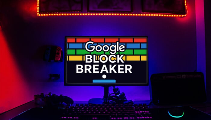 Google Block Breaker game displayed on a monitor in a gaming setup with neon lighting