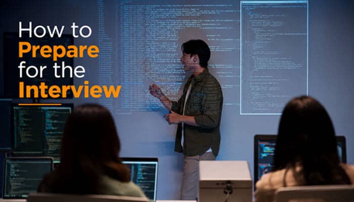 Chaturbate Software Engineer preparing for a technical interview by presenting programming concepts to software development candidates.