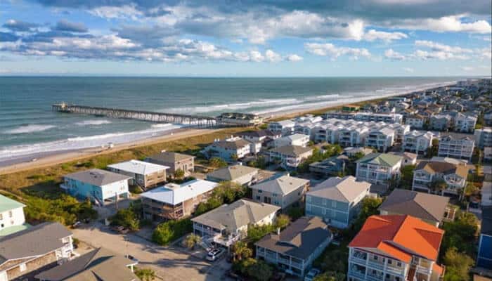 Aerial view of a coastal residential neighborhood demonstrating home values in myrtle beach, where proximity to the beach, community development, neighborhood desirability, and resale potential contribute to sustained property market growth.