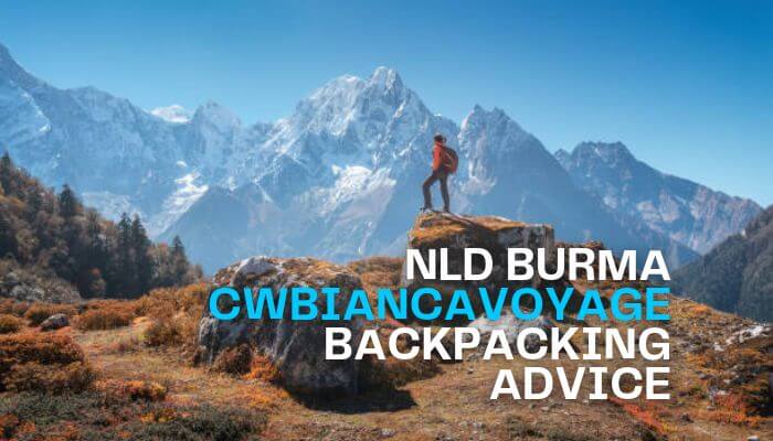 Backpacking advice cwbiancavoyage - tycoonstory | tycoonstory media Backpacking advice cwbiancavoyage image showing a solo backpacker standing on a rocky viewpoint surrounded by dramatic snow-covered mountains in nld burma.